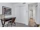 Clean bedroom with closet and view into the bathroom, plus a desk in the corner at 7557 N Dreamy Draw Dr # 154, Phoenix, AZ 85020