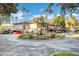 A well maintained community fountain surrounded by beautiful trees, plants and covered parking spaces at 7557 N Dreamy Draw Dr # 154, Phoenix, AZ 85020