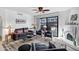 Living room featuring tile floors, neutral paint, a ceiling fan, and a sliding glass door for ample natural light at 7557 N Dreamy Draw Dr # 154, Phoenix, AZ 85020