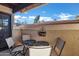 Covered patio with outdoor seating area overlooking blue skies and well-kept landscape at 7557 N Dreamy Draw Dr # 154, Phoenix, AZ 85020