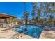 Community pool area with seating, lush trees, mountain views and BBQ facilities at 7557 N Dreamy Draw Dr # 154, Phoenix, AZ 85020