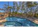 Sparkling blue pool with adjacent tanning area and BBQ, all set in a private and serene setting at 7557 N Dreamy Draw Dr # 154, Phoenix, AZ 85020