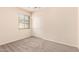 Bedroom featuring carpet flooring, ceiling fan, and a window at 9142 W Pontiac Dr, Peoria, AZ 85382