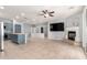 An open-concept living space with blue accents, tile flooring, and natural light at 9142 W Pontiac Dr, Peoria, AZ 85382