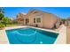 A refreshing pool with sun-drenched patio, ideal for relaxation and entertaining in a private backyard setting at 9142 W Pontiac Dr, Peoria, AZ 85382