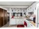Kitchen with vintage-style cabinets and a view into the dining room at 9302 E Broadway Rd # 122, Mesa, AZ 85208