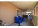 Spacious covered patio featuring plenty of seating and a relaxing area to unwind at 9302 E Broadway Rd # 122, Mesa, AZ 85208