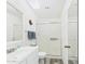 This bathroom features a white vanity, a toilet, and a glass-enclosed shower at 9915 W Mountain View Rd, Sun City, AZ 85351