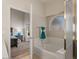 Bathroom with a large soaking tub and view to the main bedroom at 1030 S Brentwood Ct, Chandler, AZ 85286