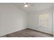 Empty bedroom with hard wood floors and a window at 1030 S Brentwood Ct, Chandler, AZ 85286