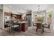 Well-equipped kitchen with stainless steel appliances, granite countertops, and a large island with seating at 1030 S Brentwood Ct, Chandler, AZ 85286