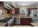 Well-equipped kitchen features stainless steel appliances and granite countertops at 1030 S Brentwood Ct, Chandler, AZ 85286