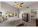 Main bedroom with vaulted ceiling, wooden floors, and a bay window at 1030 S Brentwood Ct, Chandler, AZ 85286