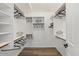 Organized walk-in closet features ample shelving and hanging space at 1030 S Brentwood Ct, Chandler, AZ 85286