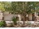 Inviting single-story home with desert landscaping, featuring a comfortable bench on the porch at 1086 E Canyon Trail --, San Tan Valley, AZ 85143