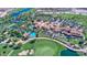 Aerial view of golf course, pool, and clubhouse at 119 E Camellia Way, San Tan Valley, AZ 85140