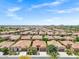 A scenic overhead shot showcases a residential neighborhood with meticulously planned landscaping at 119 E Camellia Way, San Tan Valley, AZ 85140
