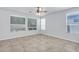 This spacious bedroom features neutral tile, lots of natural light, and ample space at 119 E Camellia Way, San Tan Valley, AZ 85140