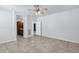 The bedroom provides access to the ensuite bathroom and has neutral tile at 119 E Camellia Way, San Tan Valley, AZ 85140