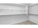 Walk-in closet with ample shelving to maximize storage space and organization at 119 E Camellia Way, San Tan Valley, AZ 85140