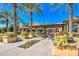Walkway with garden planters leading to residential area at 119 E Camellia Way, San Tan Valley, AZ 85140