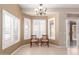 Bright dining area with large windows, perfect for Gathering meals and entertaining guests at 15073 W Piccadilly Rd, Goodyear, AZ 85395