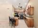 Well-equipped kitchen with a breakfast bar, ample counter space, and modern appliances at 15073 W Piccadilly Rd, Goodyear, AZ 85395