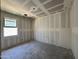 Unfinished bedroom shows drywall and a window at 15789 W Beryl Ave, Waddell, AZ 85355