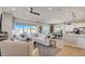 Spacious living room with a modern open-concept design and lots of natural light at 16342 W Jackson St, Goodyear, AZ 85338
