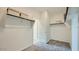 Spacious walk-in closet with carpet, shelving, and well-organized storage space for clothes and accessories at 17387 W Whispering Wind Rd, Surprise, AZ 85387