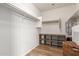A well-organized walk-in closet with shelves and hanging rods offers ample storage at 1851 W Vermont Ave, Phoenix, AZ 85015