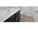 Modern bathroom featuring a sleek vanity, toilet, and bathtub at 1953 W Stage Driver St, Apache Junction, AZ 85120