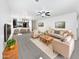 Bright living room featuring neutral tones, recessed lights, and an open floor plan at 1953 W Stage Driver St, Apache Junction, AZ 85120