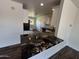 Open-concept kitchen with granite countertops and a view of the living area at 2325 E Osborn Rd, Phoenix, AZ 85016