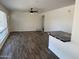 Inviting living room with modern flooring and easy access to the kitchen and front entrance at 2325 E Osborn Rd, Phoenix, AZ 85016
