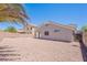Large backyard with desert landscaping providing a clean and simple outdoor space at 23852 W La Salle St, Buckeye, AZ 85326