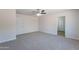 Spacious bedroom with plush carpet and natural lighting at 23852 W La Salle St, Buckeye, AZ 85326