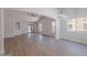 Bright, open living room with wood-look floors and lots of natural light at 23852 W La Salle St, Buckeye, AZ 85326