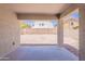 Covered patio overlooking a low maintenance backyard at 23852 W La Salle St, Buckeye, AZ 85326