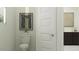 A clean, well lit half bath features artwork and a modern design at 25169 N 177Th Dr, Surprise, AZ 85387