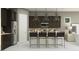 A modern kitchen featuring dark cabinets, stainless steel appliances, and a stylish island at 25169 N 177Th Dr, Surprise, AZ 85387