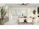 An airy living room features neutral tones, stylish furniture, and modern decor at 25169 N 177Th Dr, Surprise, AZ 85387