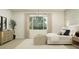 A relaxing main bedroom features neutral colors, soft lighting, and cozy furnishings at 25169 N 177Th Dr, Surprise, AZ 85387