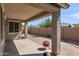Wide covered patio featuring brick pavers, concrete slab, and block wall at 3326 N 31St St, Mesa, AZ 85213