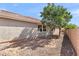 Side yard featuring desert landscaping and block fence at 3326 N 31St St, Mesa, AZ 85213