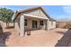 Covered patio with brick pavers extending to home and backyard wall at 3326 N 31St St, Mesa, AZ 85213