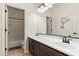 Bright bathroom featuring a single sink vanity, tub, shower, and decorative wall art at 3326 N 31St St, Mesa, AZ 85213