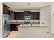 Modern kitchen featuring an island, stainless steel appliances, and lots of cabinet space at 3326 N 31St St, Mesa, AZ 85213