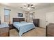Nicely decorated main bedroom with carpet, stylish furniture, and warm natural lighting at 3326 N 31St St, Mesa, AZ 85213