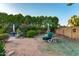 Beautiful backyard featuring green grass, patio and mature landscaping at 4046 E Crocus Dr, Phoenix, AZ 85032